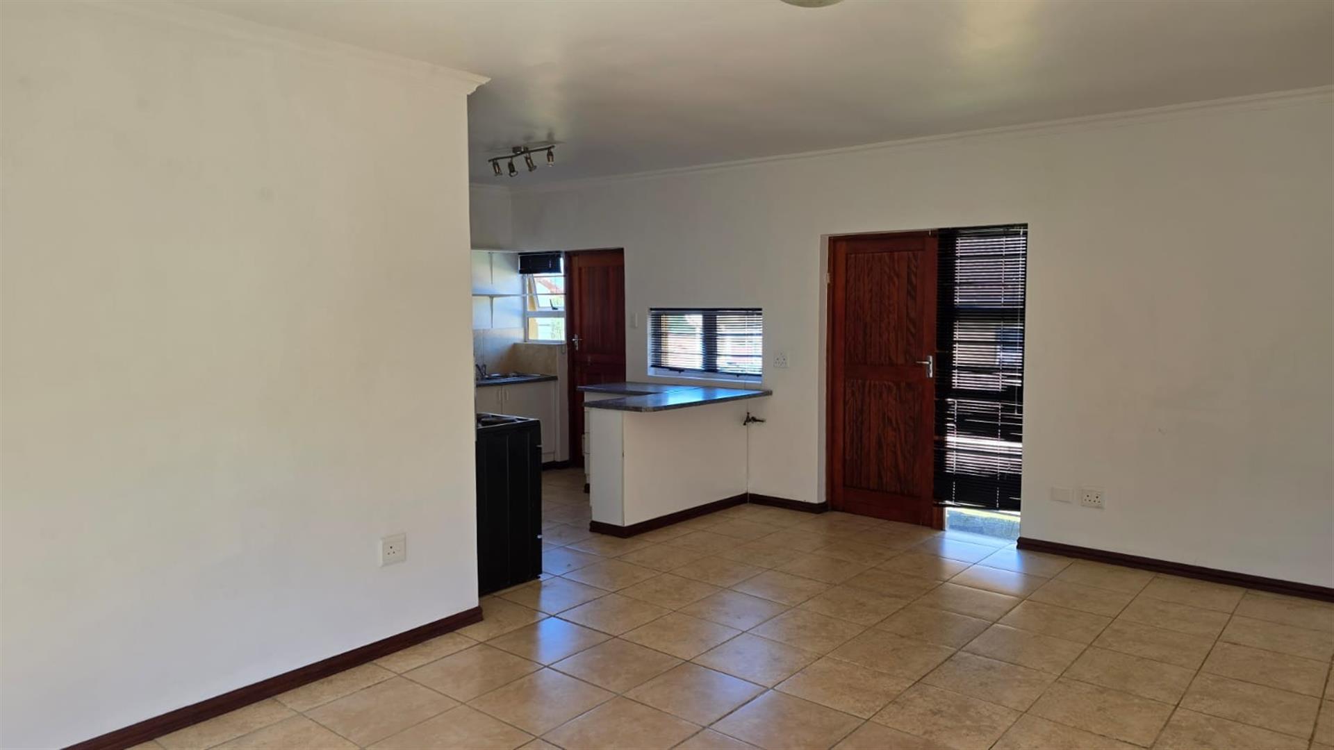 Well-Located 2-Bedroom Home in a Gated Complex