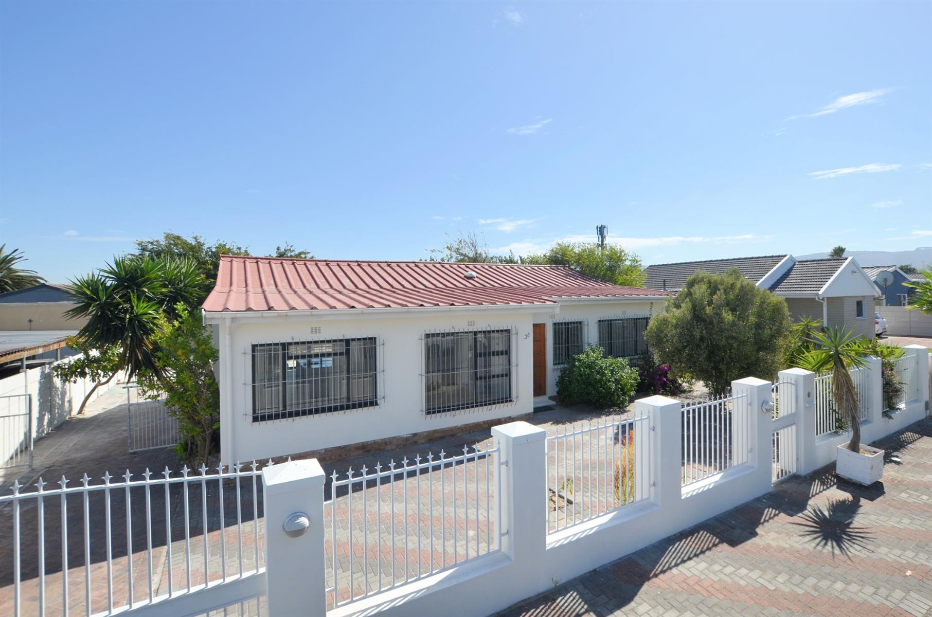 Freshly Renovated Modern Home with Study and Two Garages