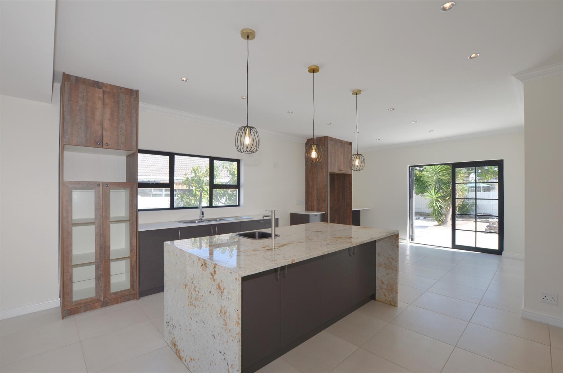 Freshly Renovated Modern Home with Study and Two Garages