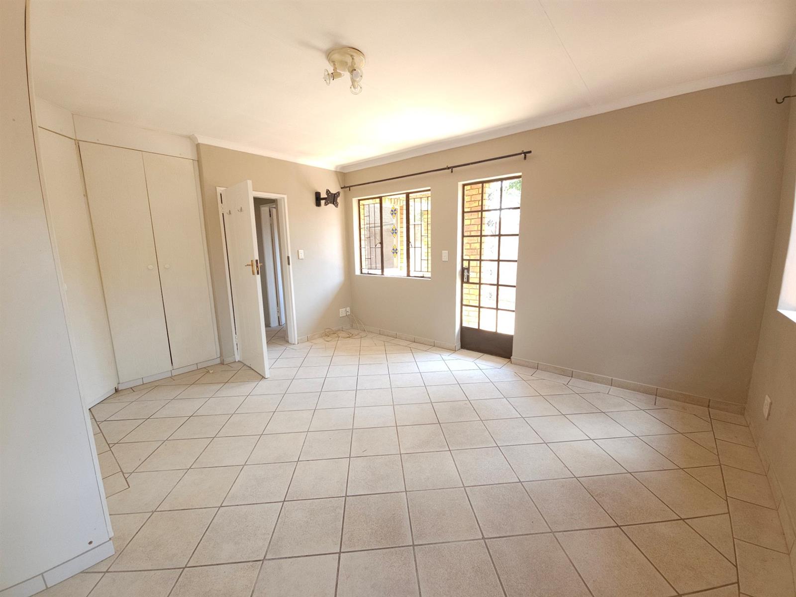 Not your ordinary two-bedroom townhouse, this Clubview duet is no cookie-cutter home.