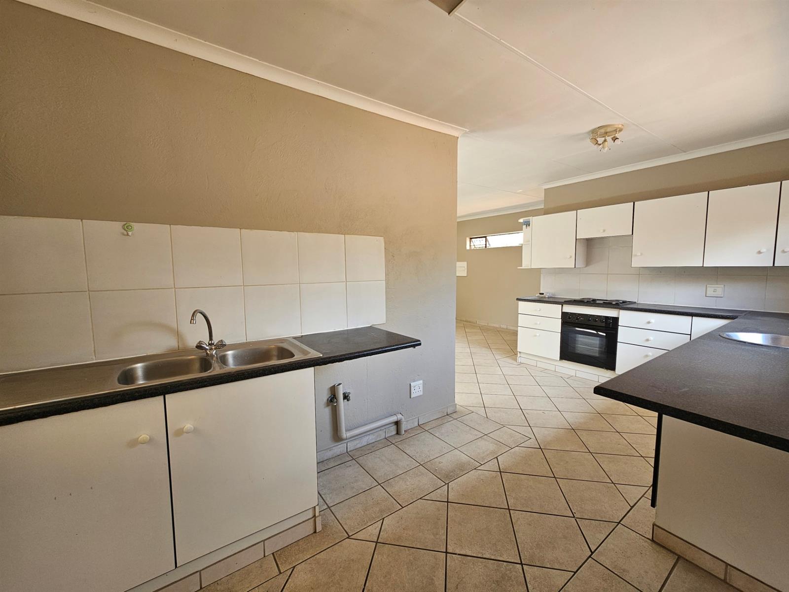 Not your ordinary two-bedroom townhouse, this Clubview duet is no cookie-cutter home.