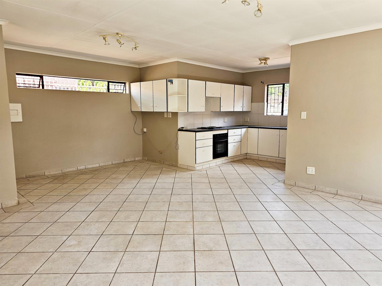 Not your ordinary two-bedroom townhouse, this Clubview duet is no cookie-cutter home.