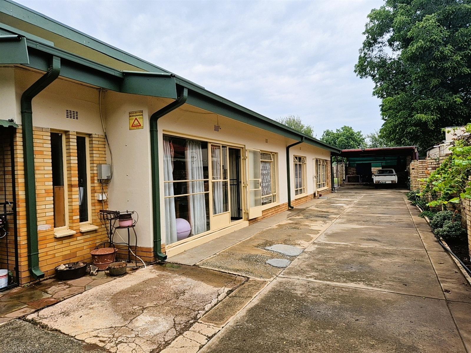 Spacious Family Home with 2 Flatlets on Expansive 2056m² Stand in Potchefstoom Central