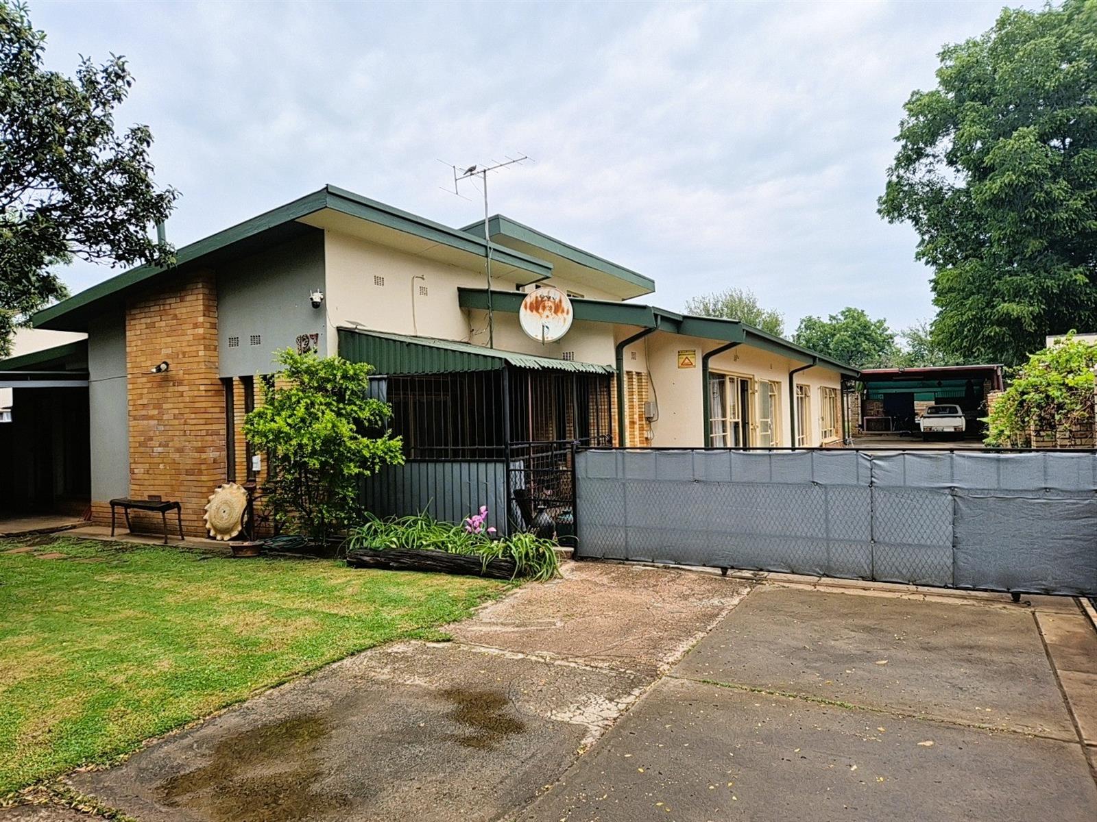 Spacious Family Home with 2 Flatlets on Expansive 2056m² Stand in Potchefstoom Central
