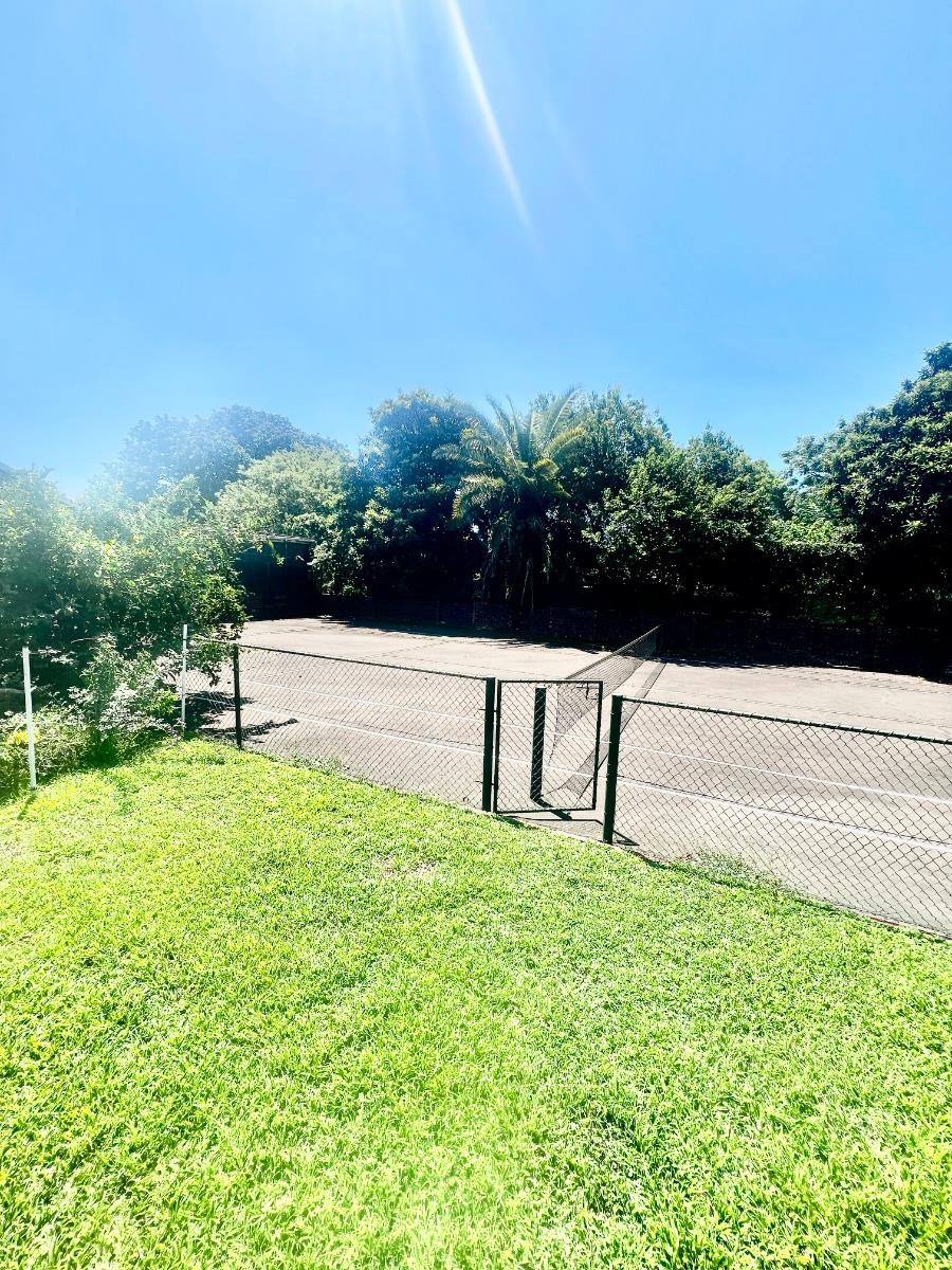 Exceptional lifestyle home with tennis court, entertainment wing, pool, and flatlet