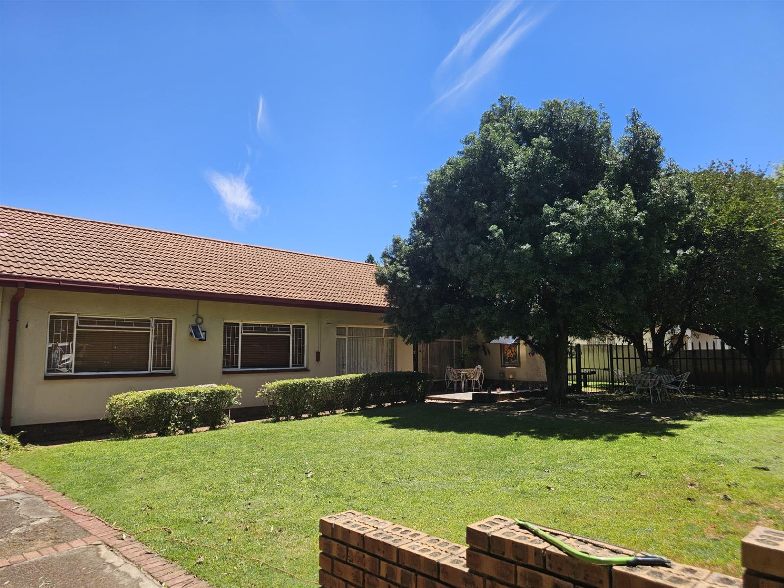 Two houses on one stand for the extended family. An opportunity to make this your own.