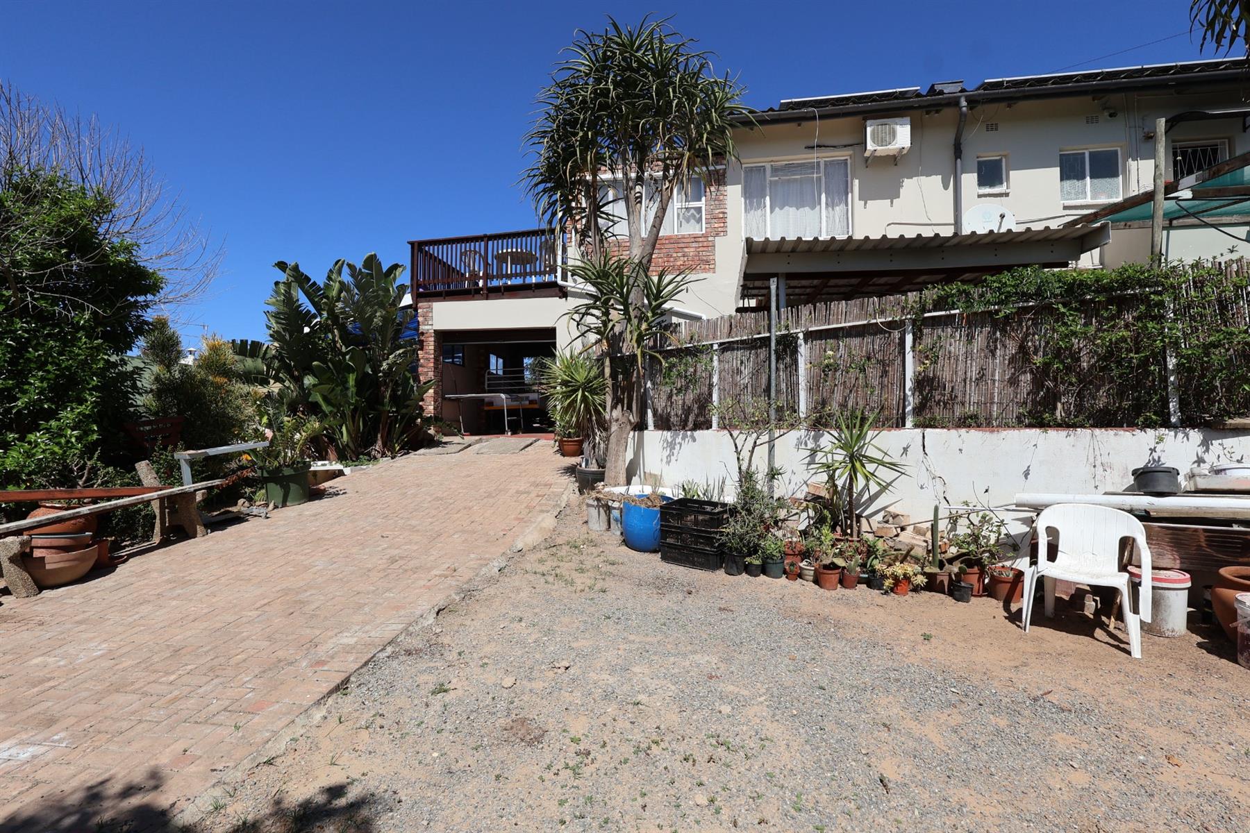 Generous Double-Storey Living with River Outlook and Income Potential