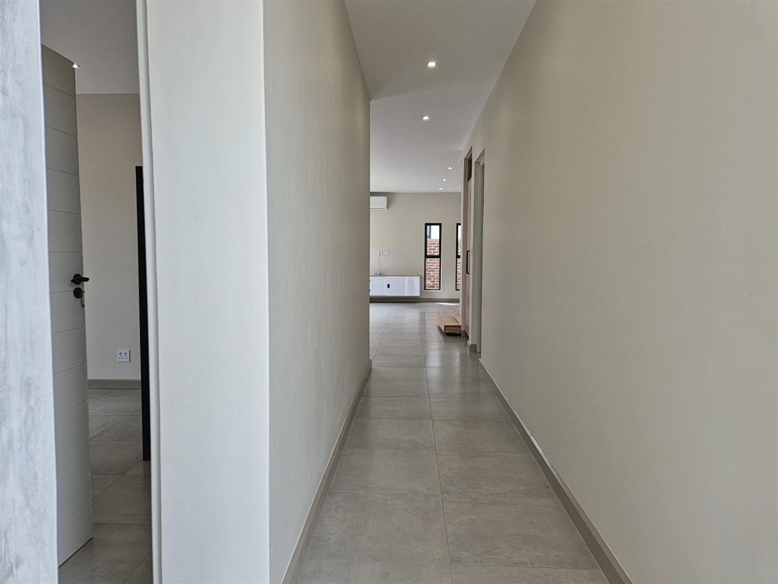 Modern Double-Storey Solar Elegance with High Ceilings and Luxury Finishes - Sustainable Design