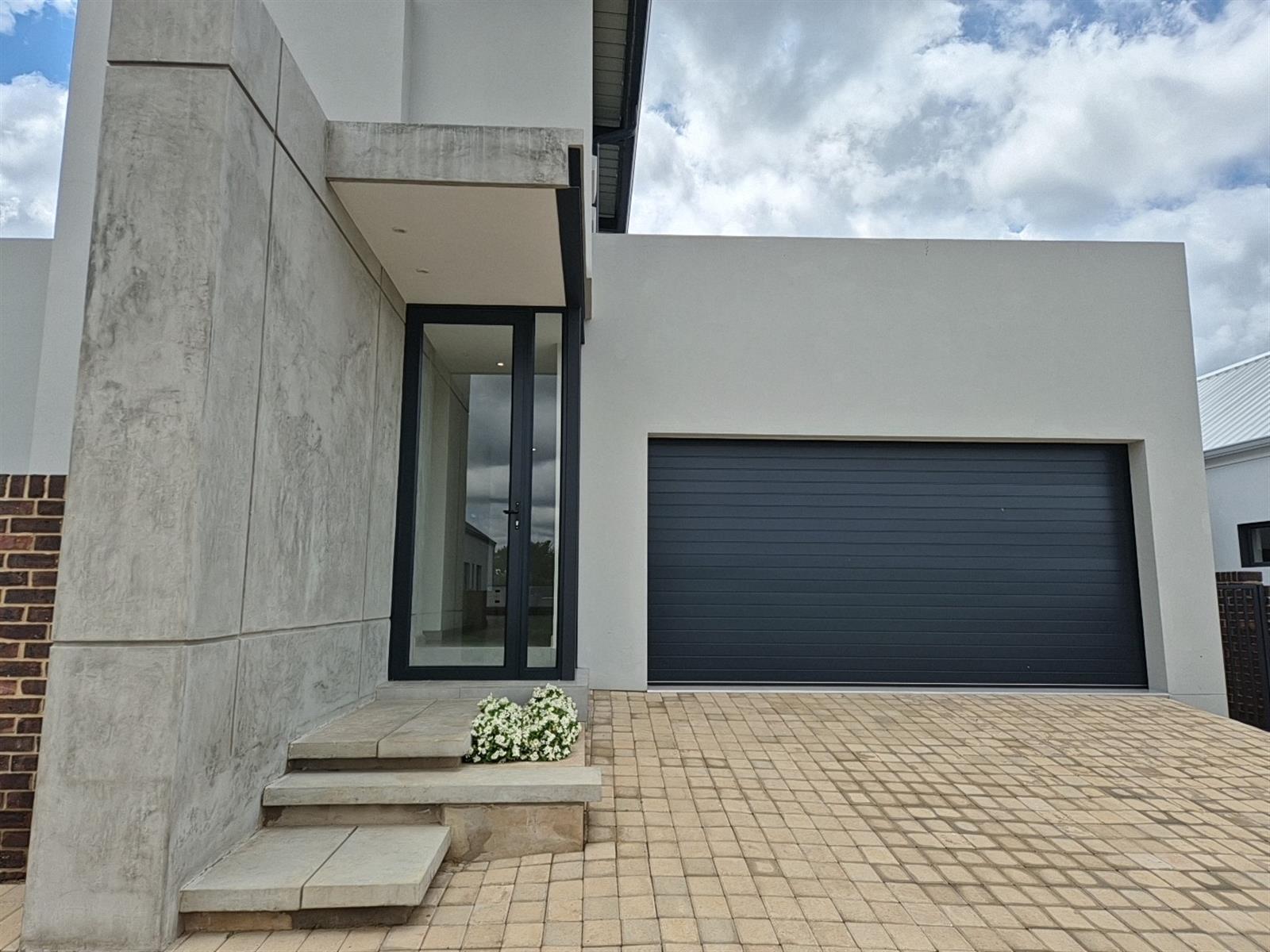 Modern Double-Storey Solar Elegance with High Ceilings and Luxury Finishes - Sustainable Design