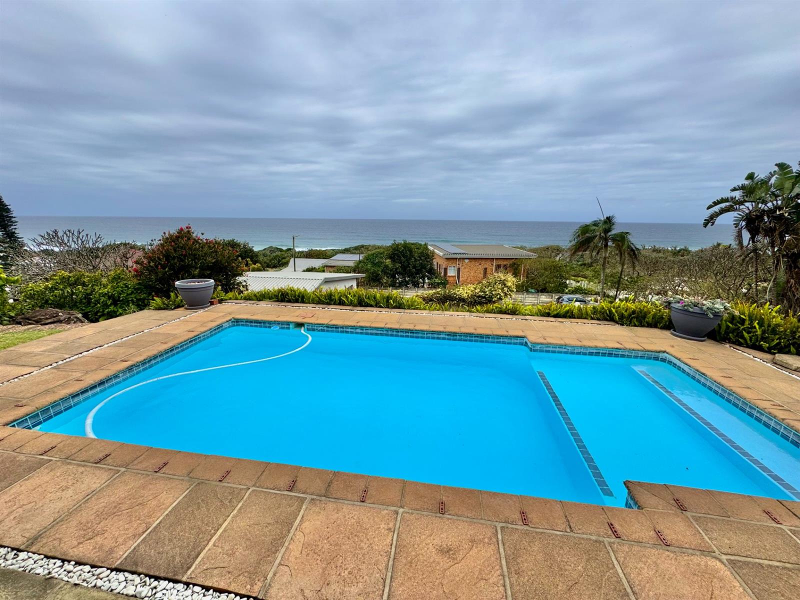Elegant Hilltop Home Just Moments from the Beach