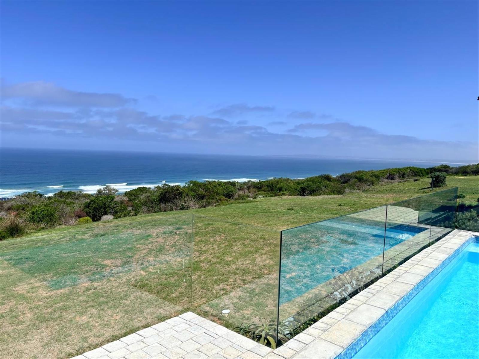 Luxury Coastal Investment Opportunity with Breathtaking White-Water Ocean Views!
