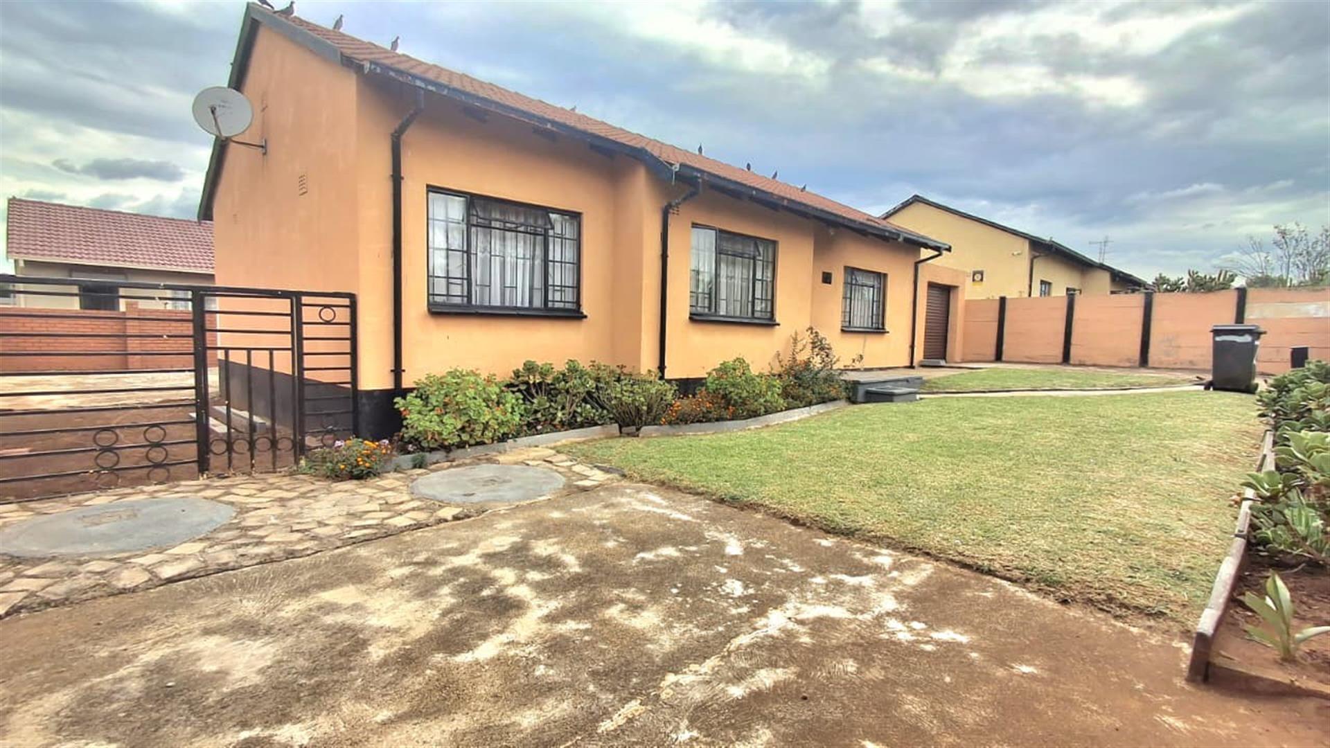 Spacious 3-Bedroom Family Home with Extra Living Area and Secure Yard Parking