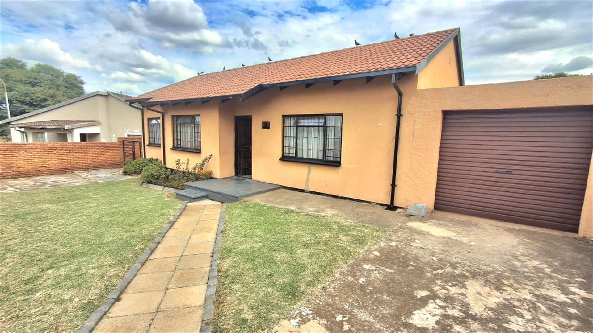Spacious 3-Bedroom Family Home with Extra Living Area and Secure Yard Parking