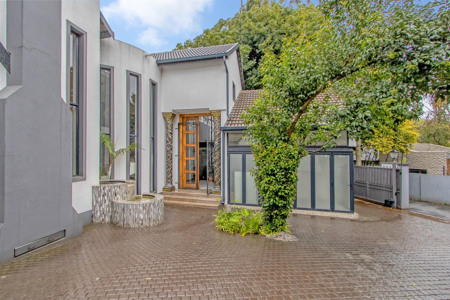 Iconic multi residence luxury home in prestigious Illovo