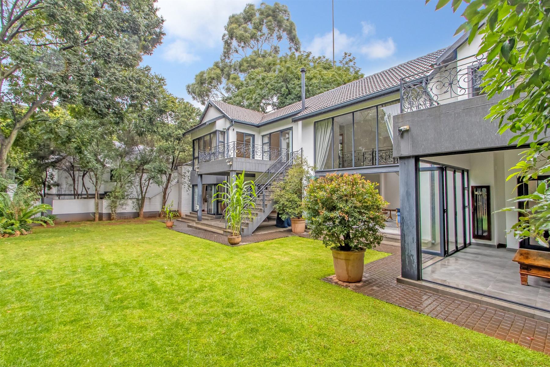 Iconic multi residence luxury home in prestigious Illovo