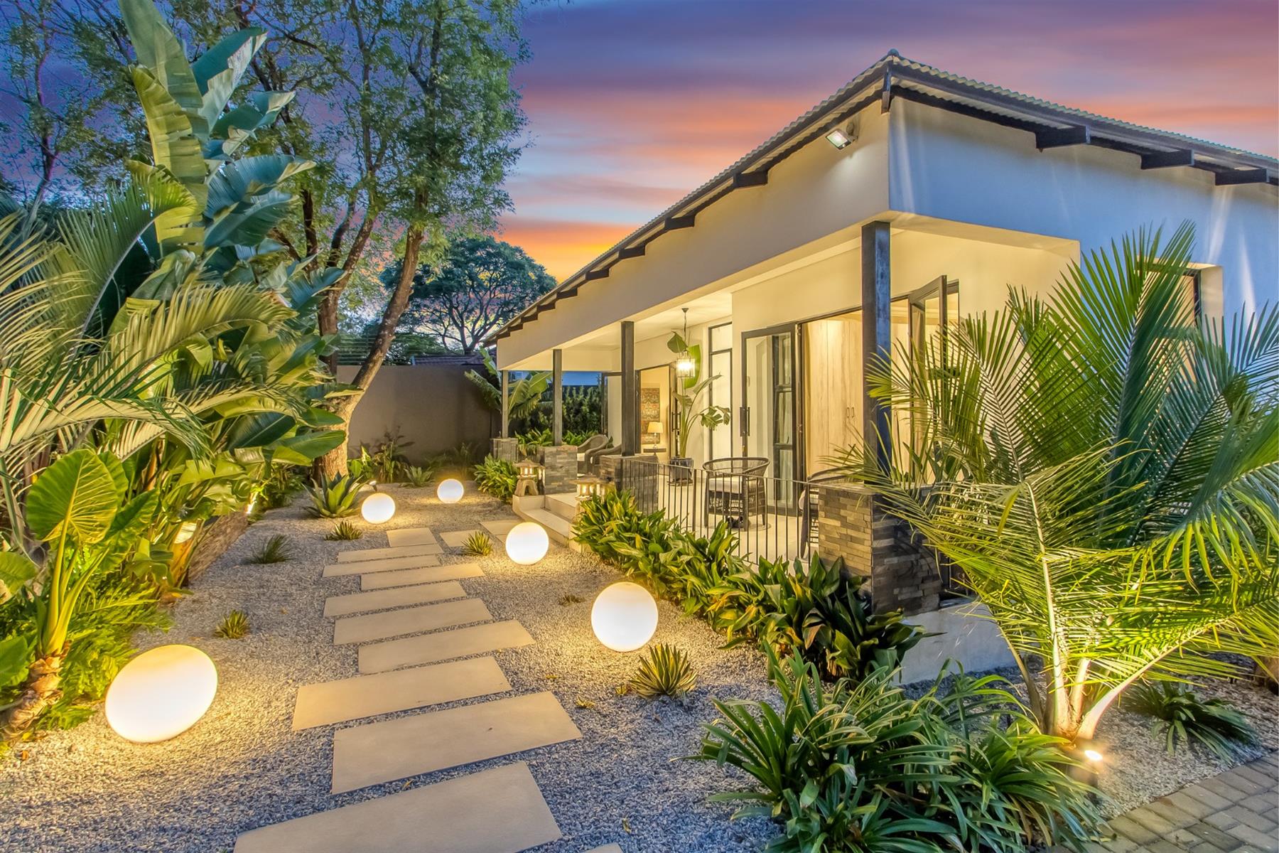 Spacious Bali-inspired designer home with pool, solar and elegant entertaining spaces