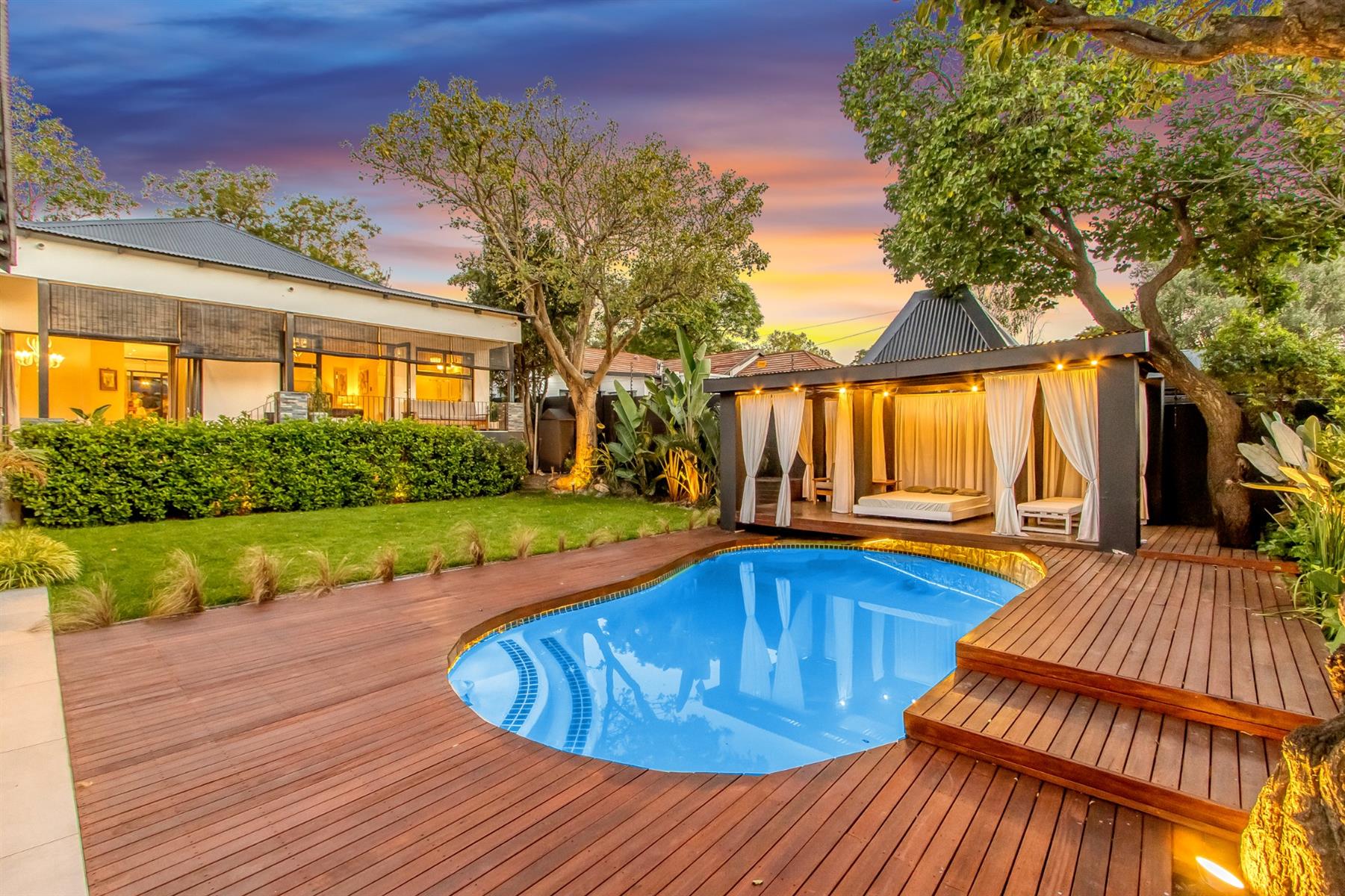 Spacious Bali-inspired designer home with pool, solar and elegant entertaining spaces