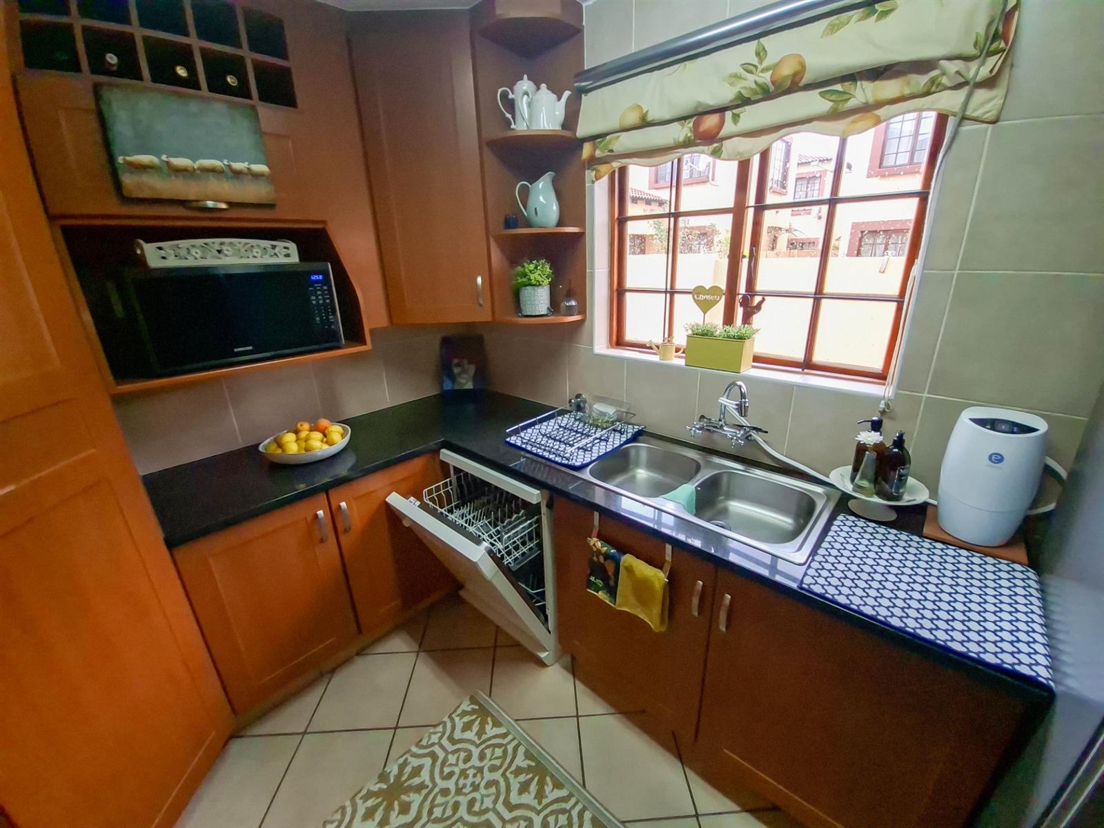 3 bedroom townhouse for sale with a large private garden in a secure and well positioned complex
