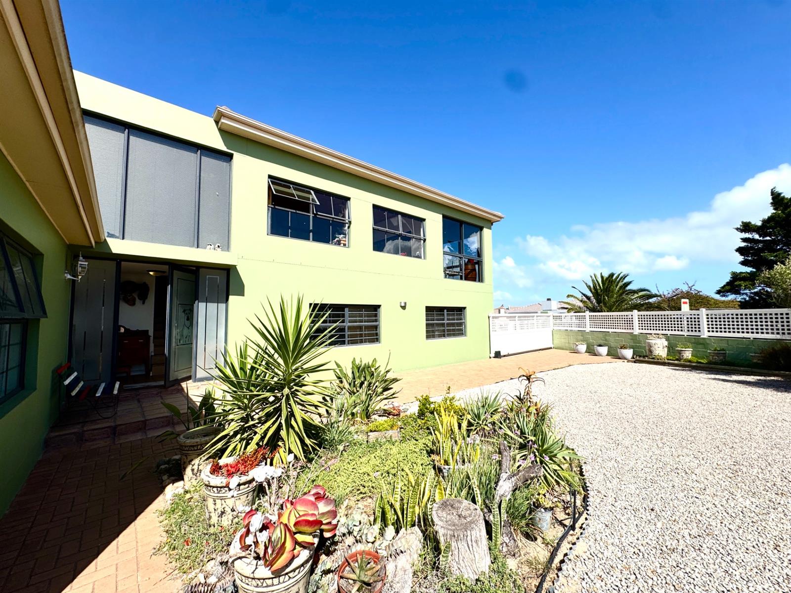 Hidden Corner Sanctuary with Lagoon Views  An Exceptional Entertainer’s Charm in Langebaan