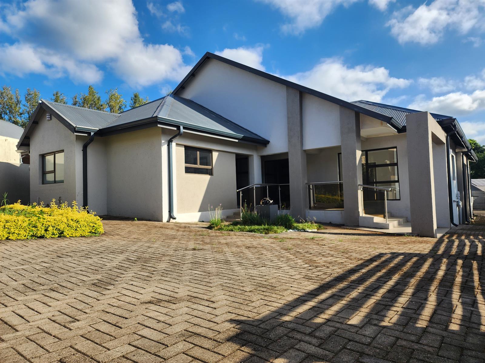 Contemporary Family Living with Added Versatility in Golden Acres Estate