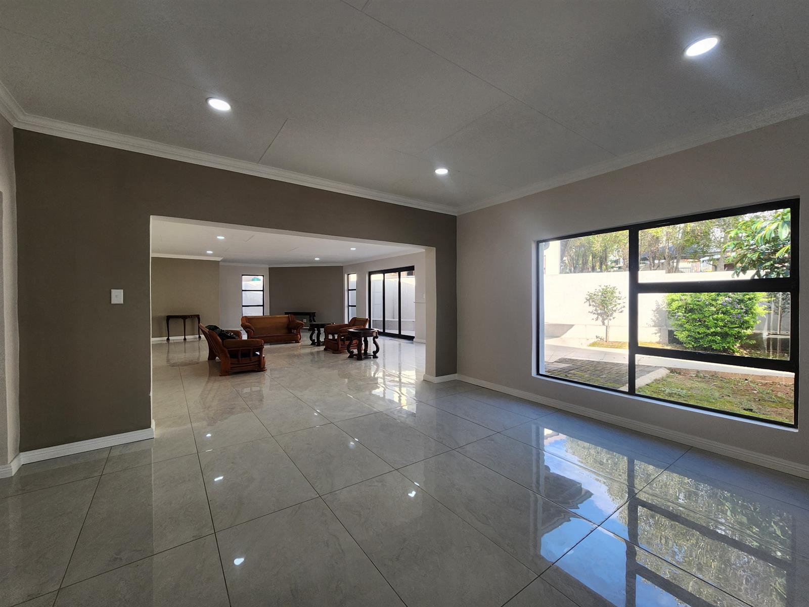 Contemporary Family Living with Added Versatility in Golden Acres Estate