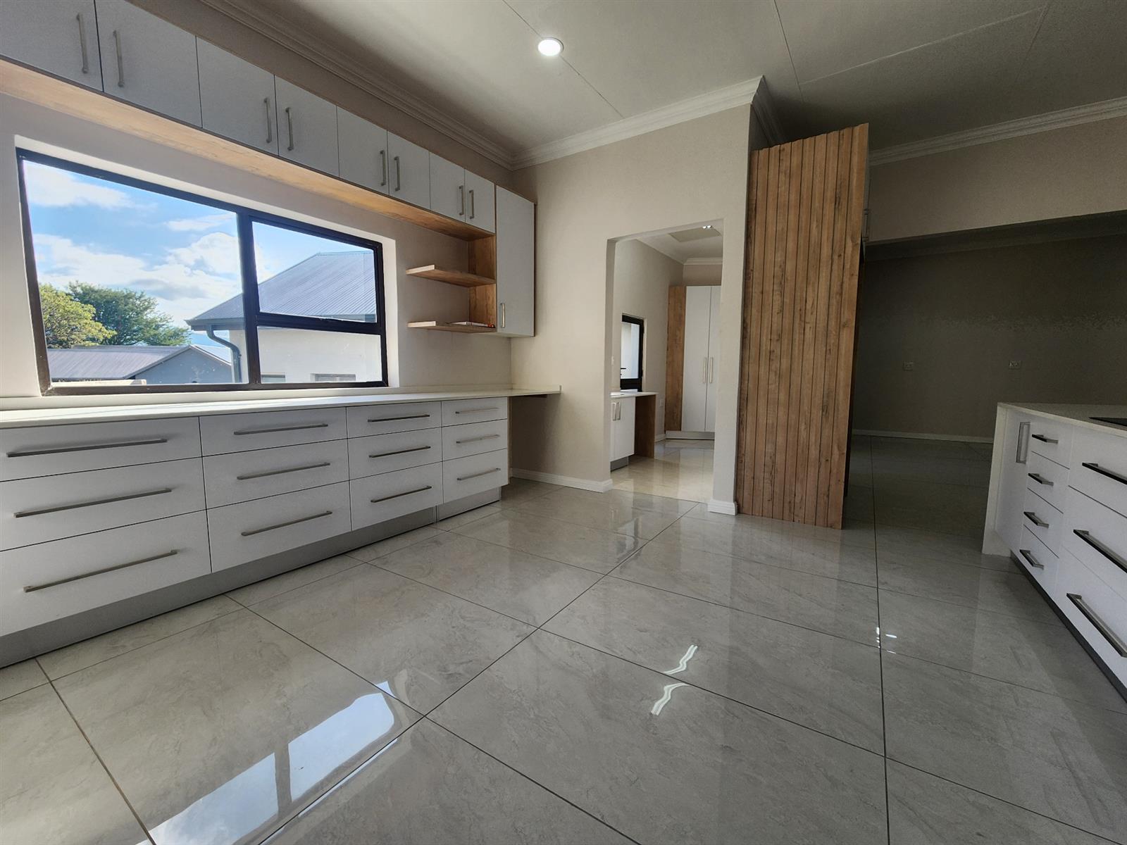 Contemporary Family Living with Added Versatility in Golden Acres Estate