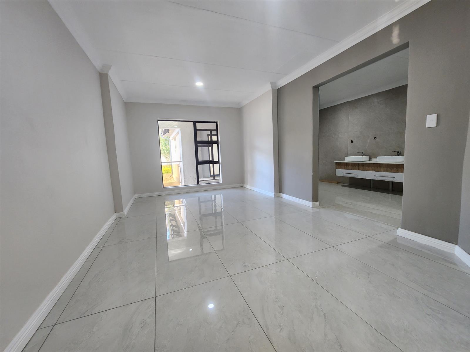 Contemporary Family Living with Added Versatility in Golden Acres Estate