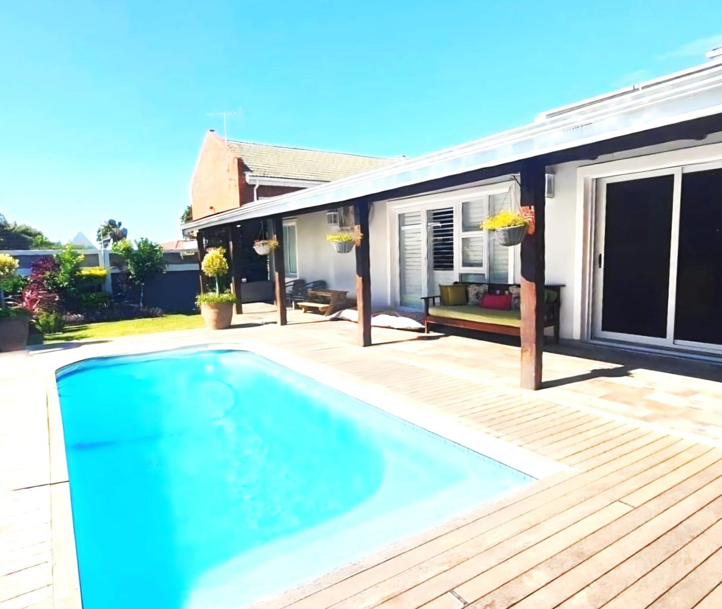 Modern Coastal Elegance with Heated Pool and Versatile Studio