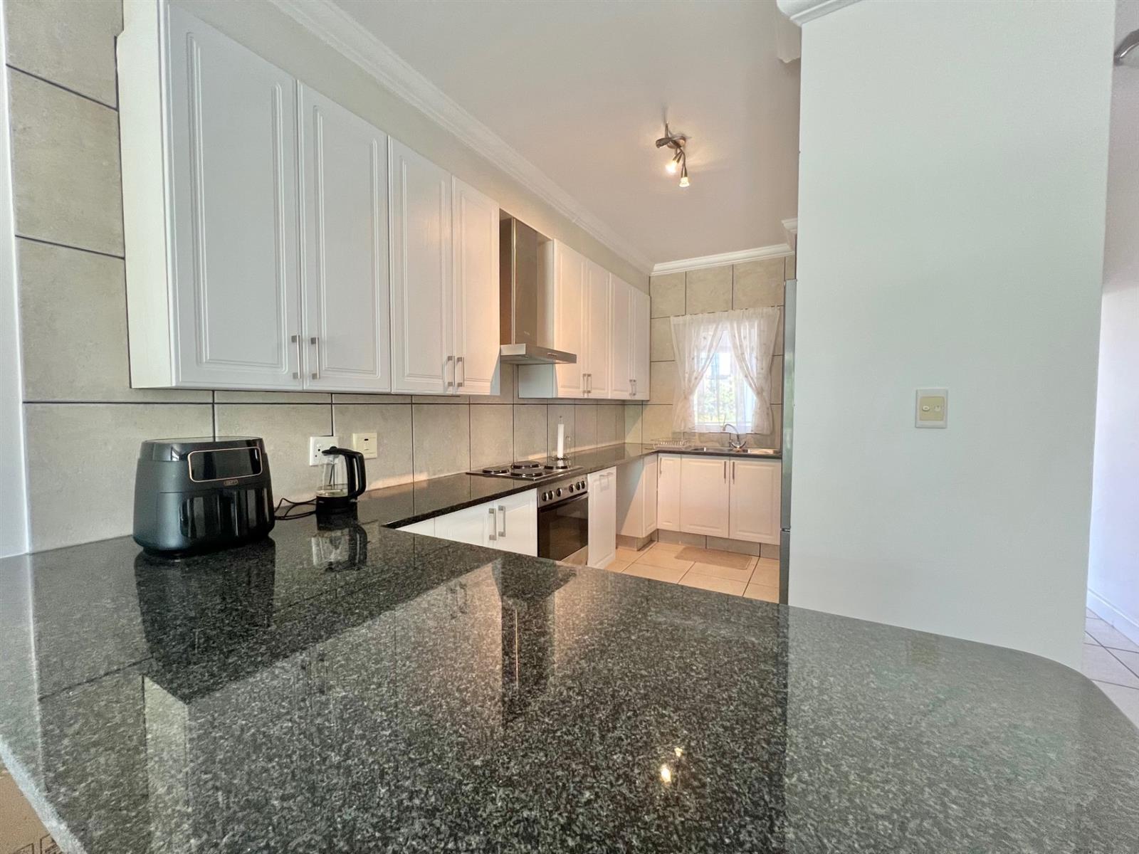 Airbnb Opportunity - Spacious 1-Bedroom Apartment with Treetop Views in Secure Setting