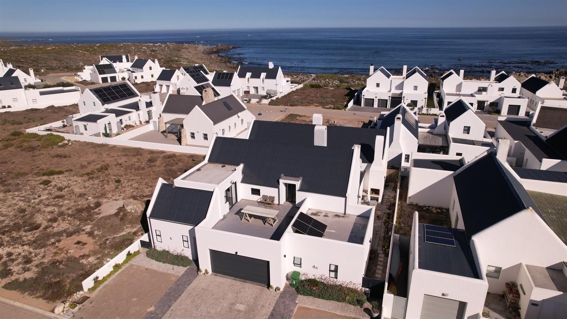Quiet Coastal Elegance - A Calm Sanctuary with Ocean Views in Toothrock Estate, Jacobsbaai
