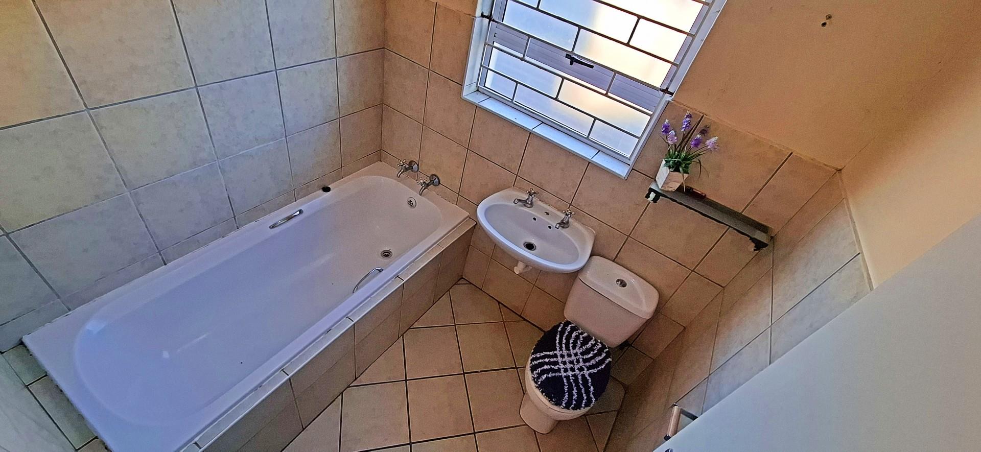 Two bedrooms and spacious secured back yard, FOR SALE