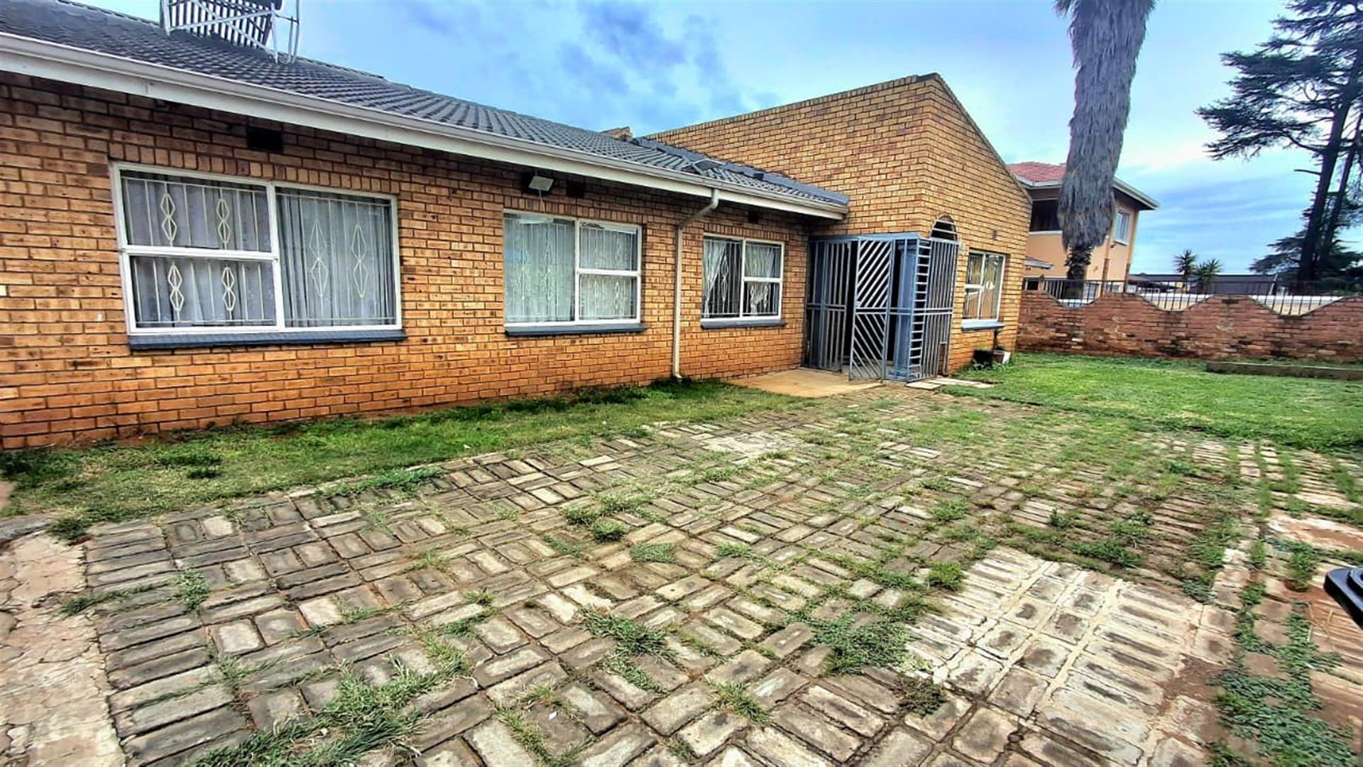 Income-Generating Property: 3-Bedroom House + 2-Bed Flat + Bachelor Unit on Double Stand