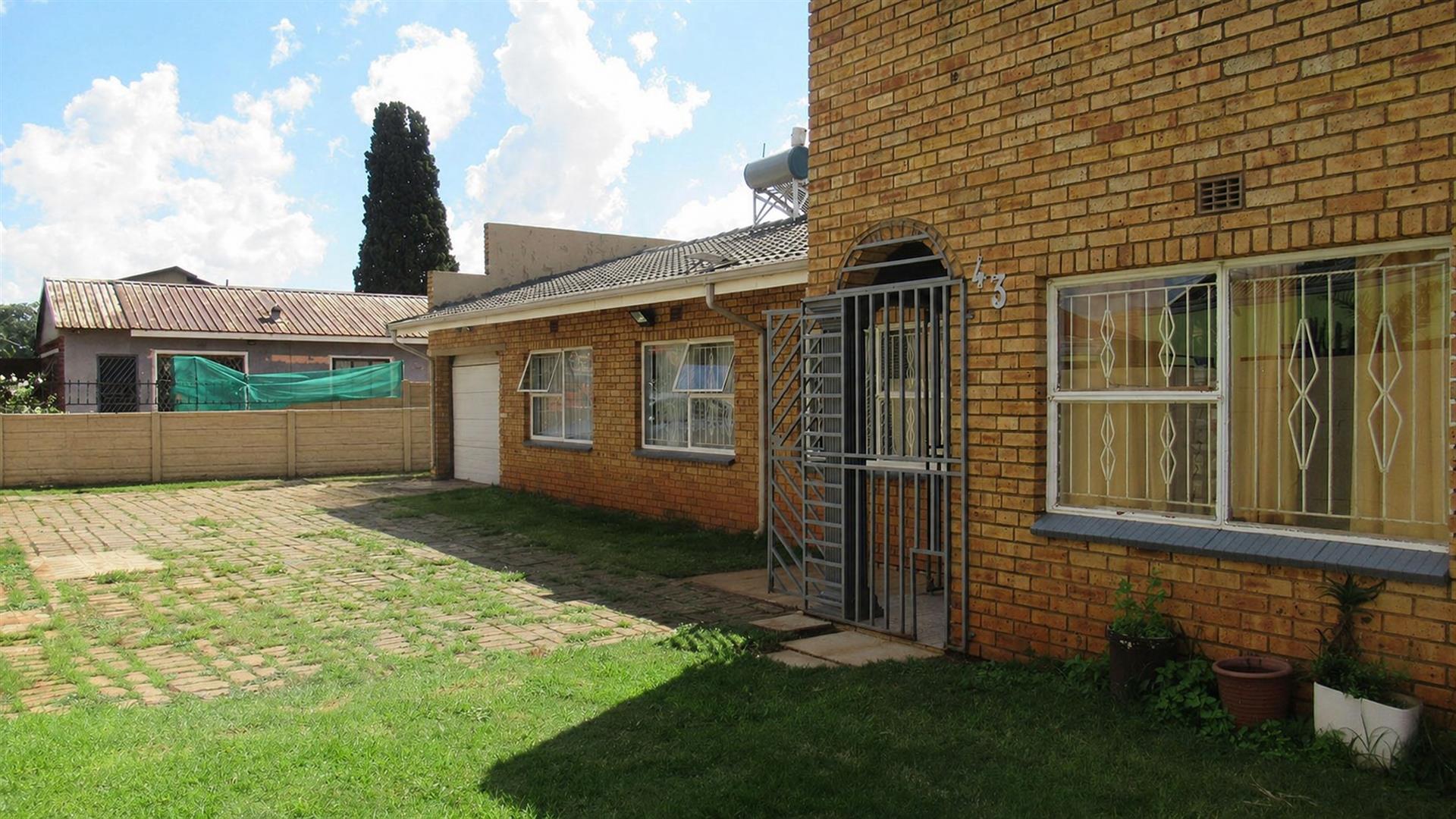 Income-Generating Property: 3-Bedroom House + 2-Bed Flat + Bachelor Unit on Double Stand