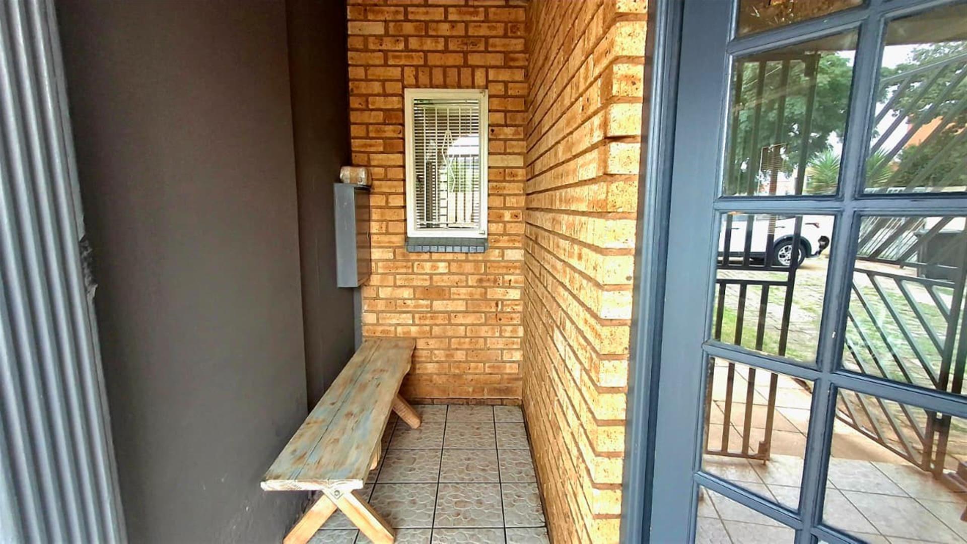 Income-Generating Property: 3-Bedroom House + 2-Bed Flat + Bachelor Unit on Double Stand