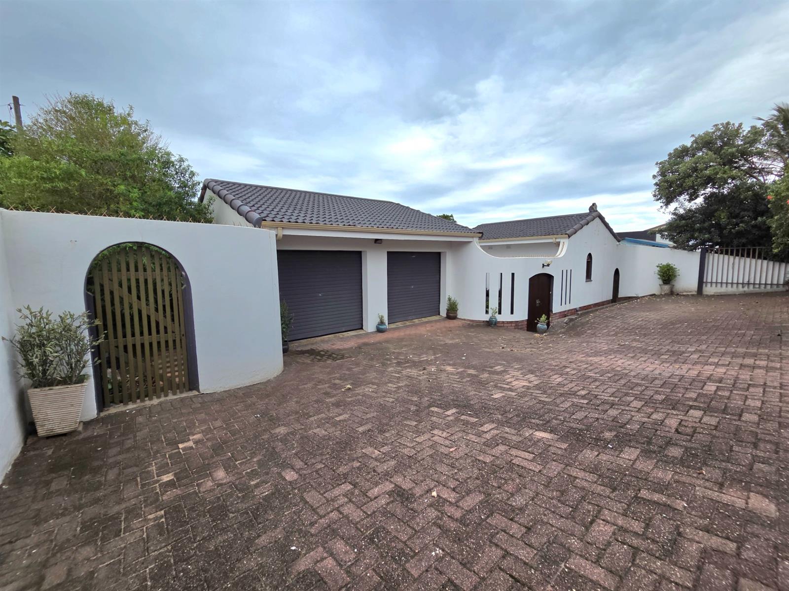 Elegant Seaside Retreat with Guest House Potential