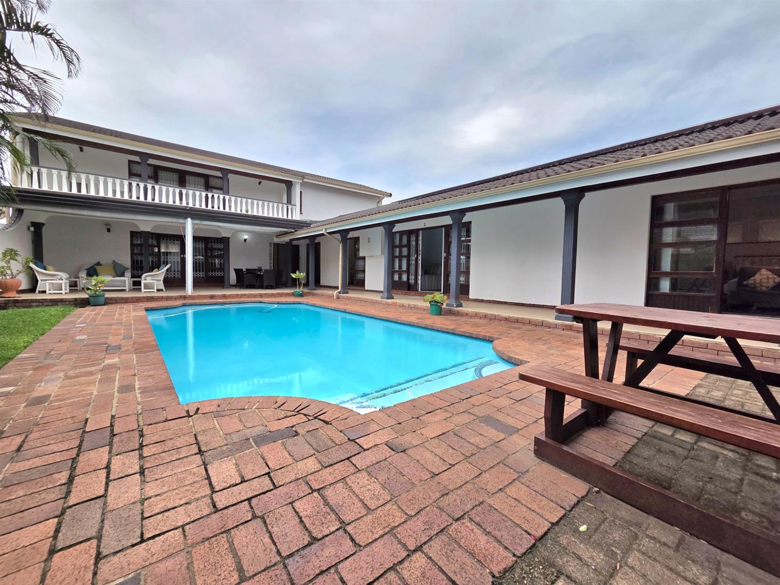 Elegant Seaside Retreat with Guest House Potential