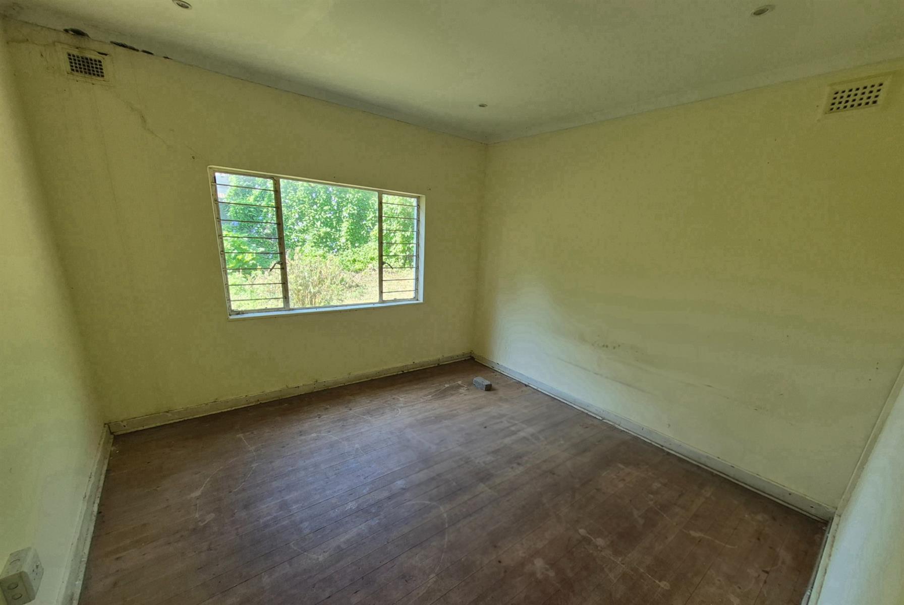 Two Properties in One - Development or Business opportunity -