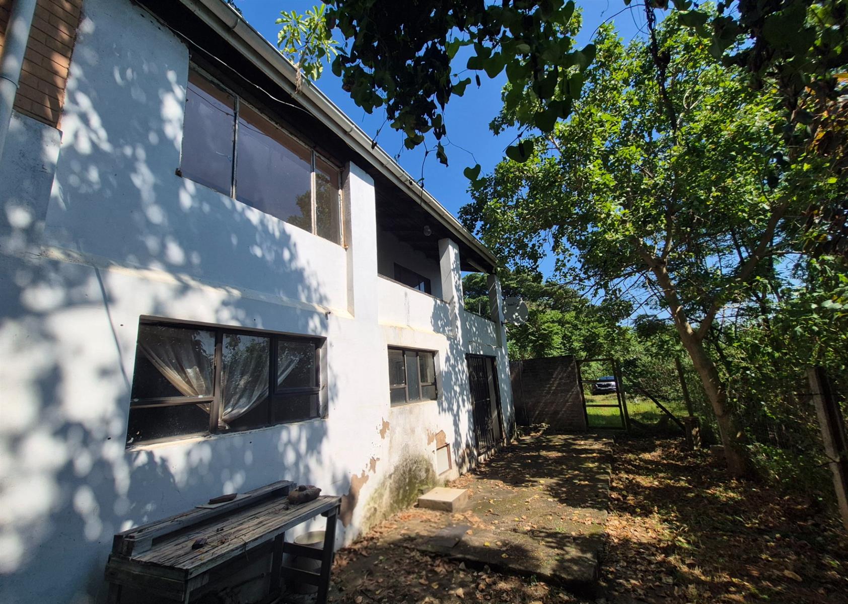 Two Properties in One - Development or Business opportunity -