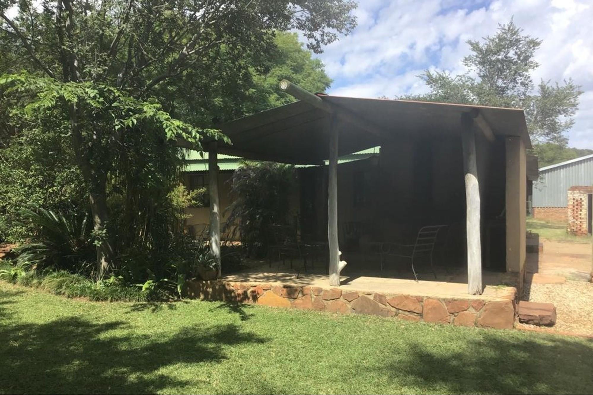 Farm on 43ha with solar power, strong borehole and income potential.