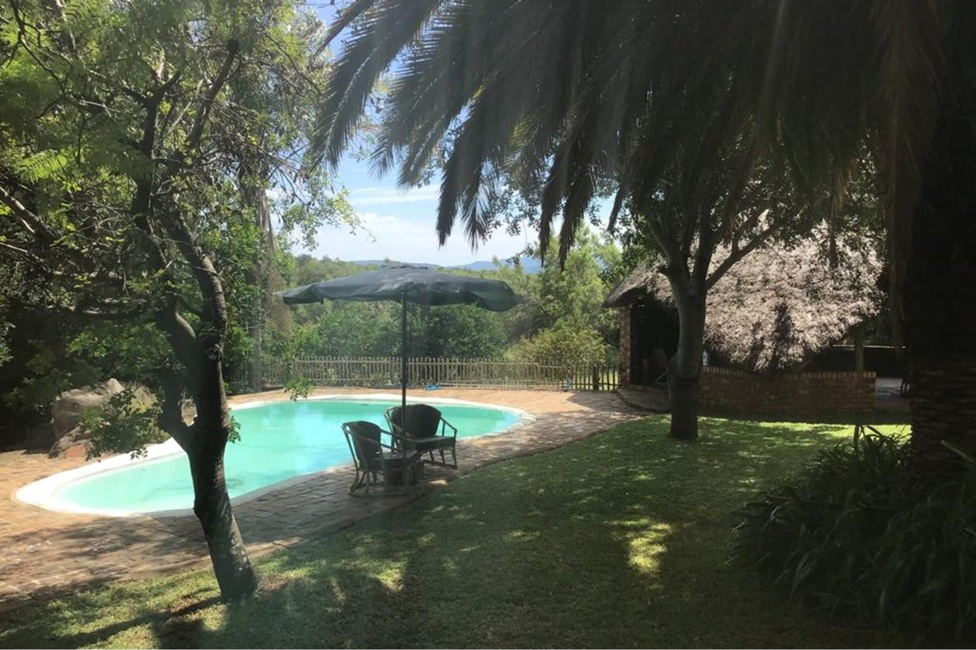 Farm on 43ha with solar power, strong borehole and income potential.