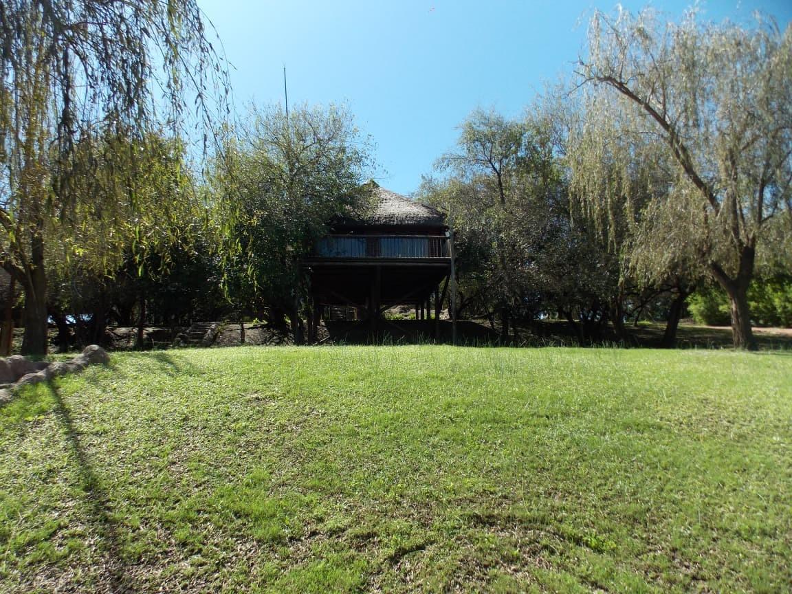 Farm for sale with a lot of opportunities and fishing chalets next to the Vaal River.
