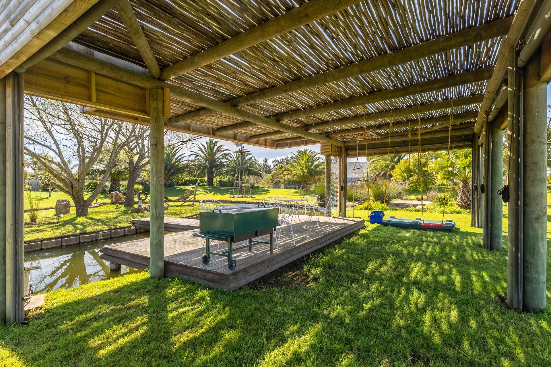 Small Holding Residence Crafted for Comfort and Entertainment