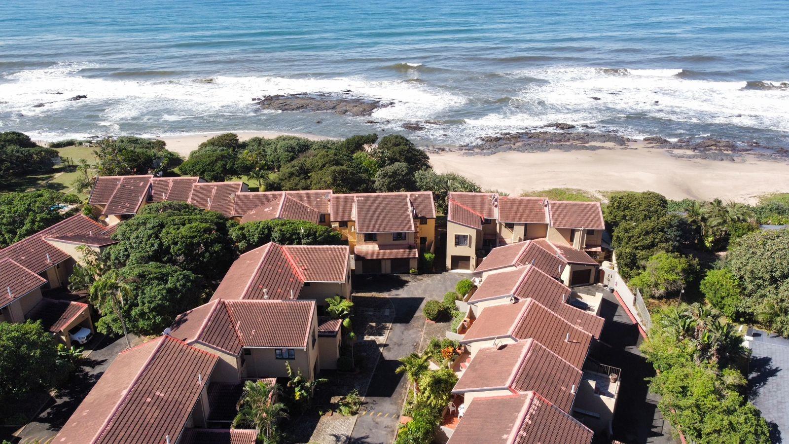 Coastal Comfort Meets Investment Potential - Stylish Duplex Steps from the Beach