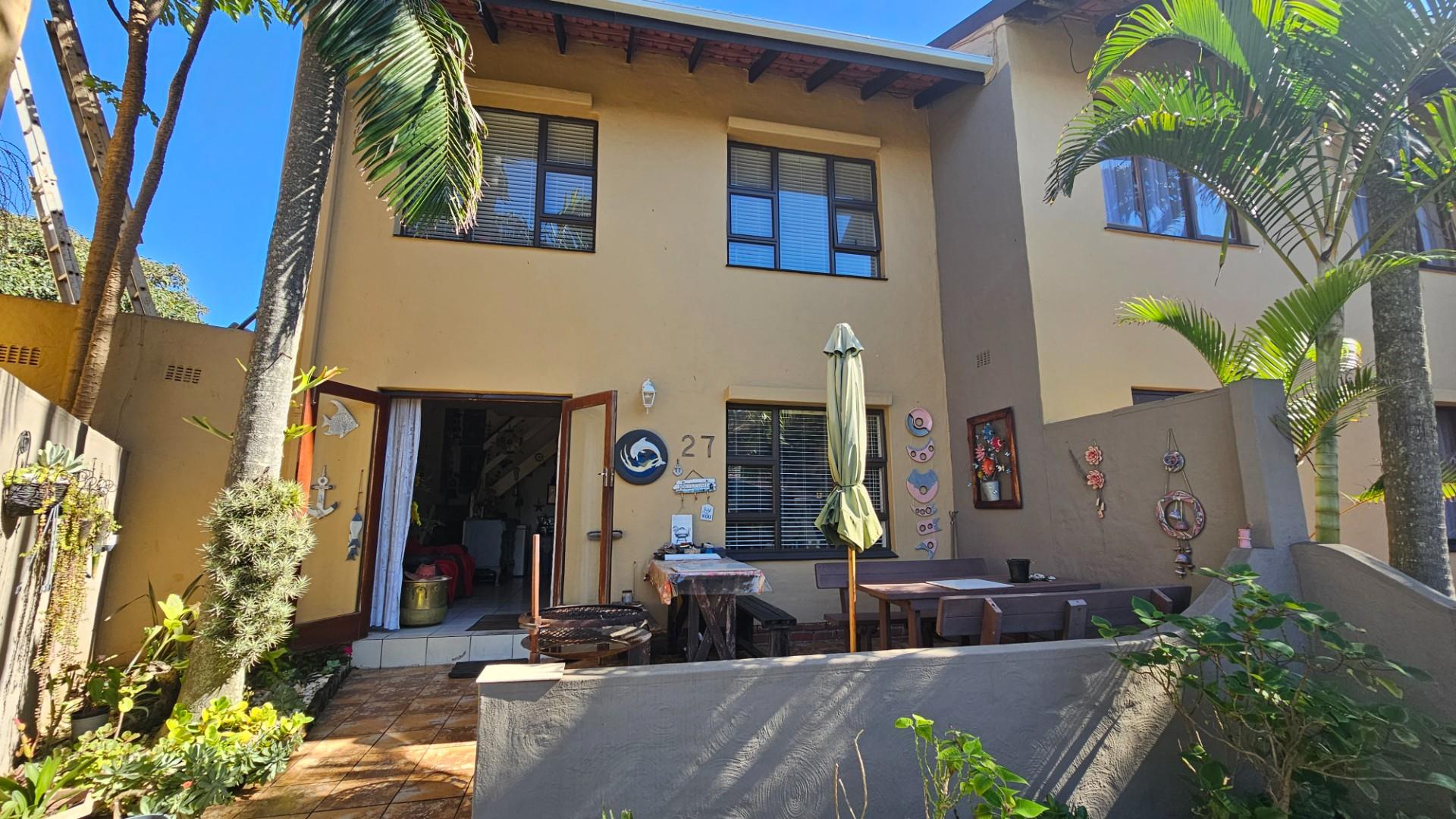 Coastal Comfort Meets Investment Potential - Stylish Duplex Steps from the Beach