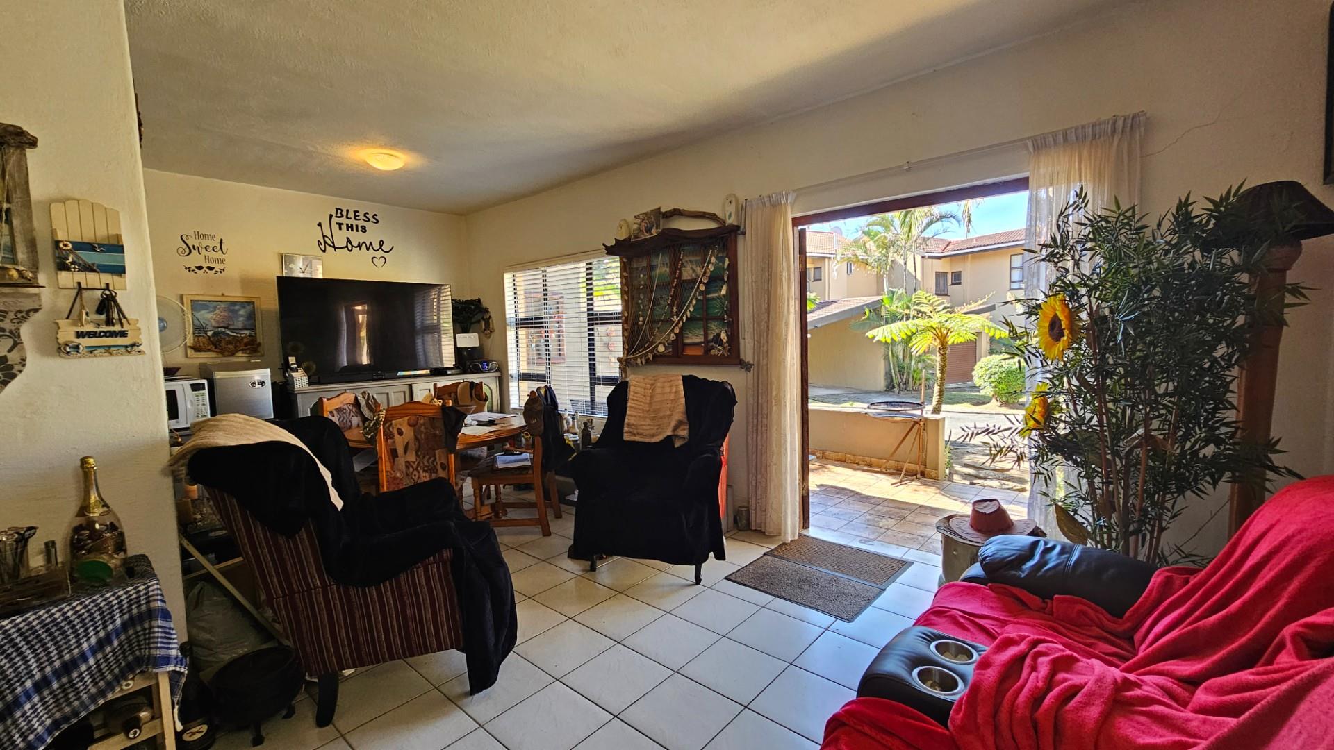 Coastal Comfort Meets Investment Potential - Stylish Duplex Steps from the Beach