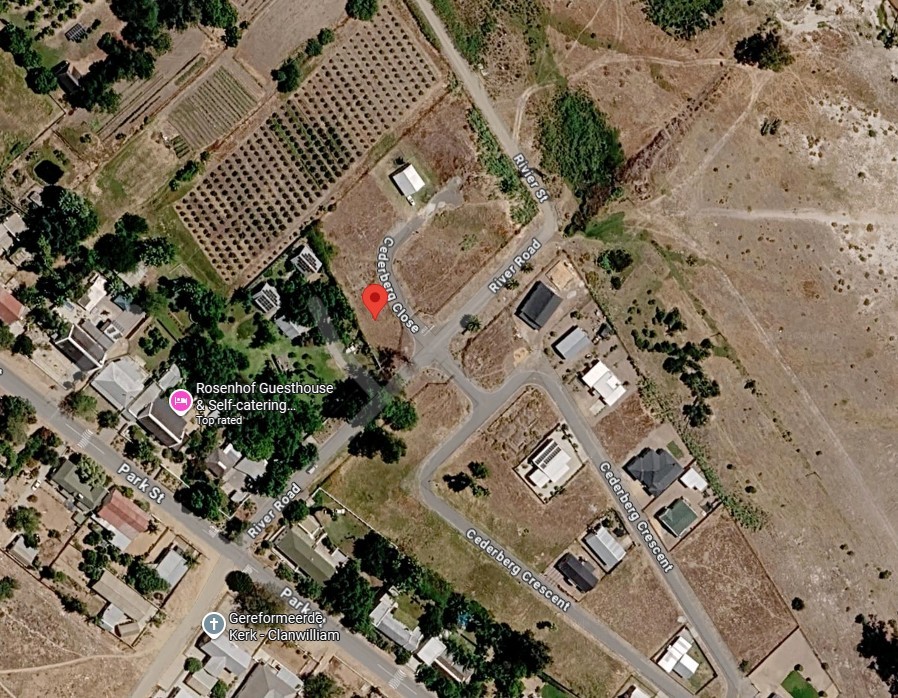 5 vacant plots in fully walled area with gate in Clanwilliam
