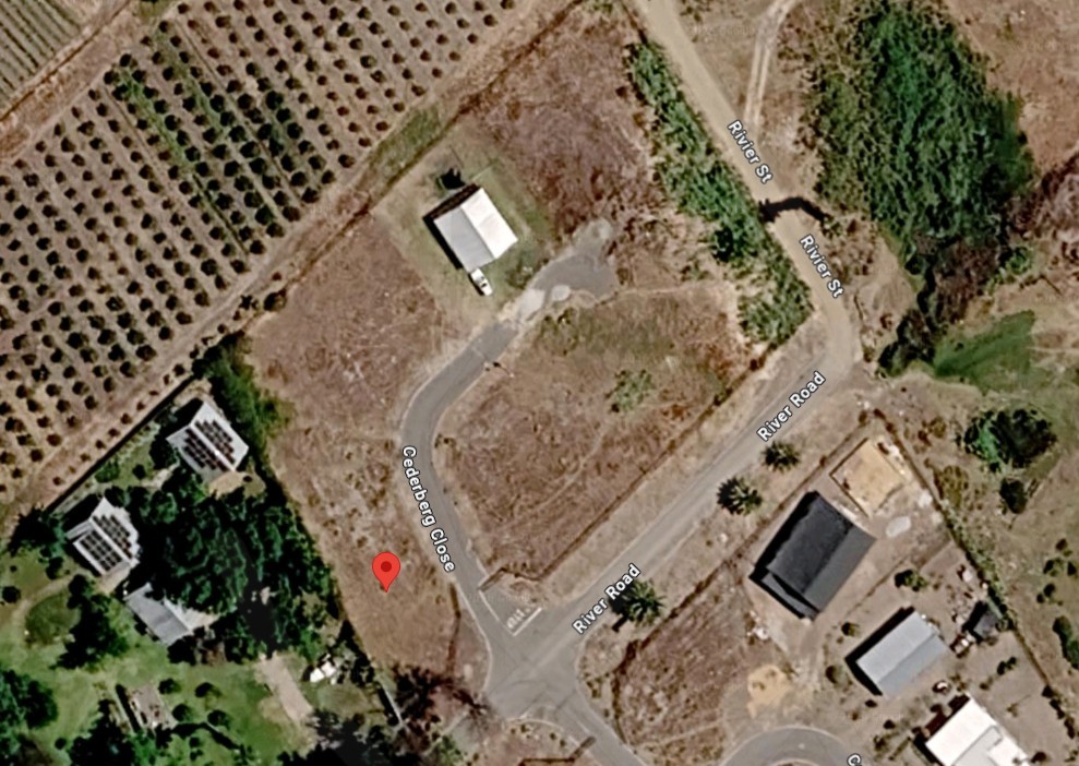5 vacant plots in fully walled area with gate in Clanwilliam