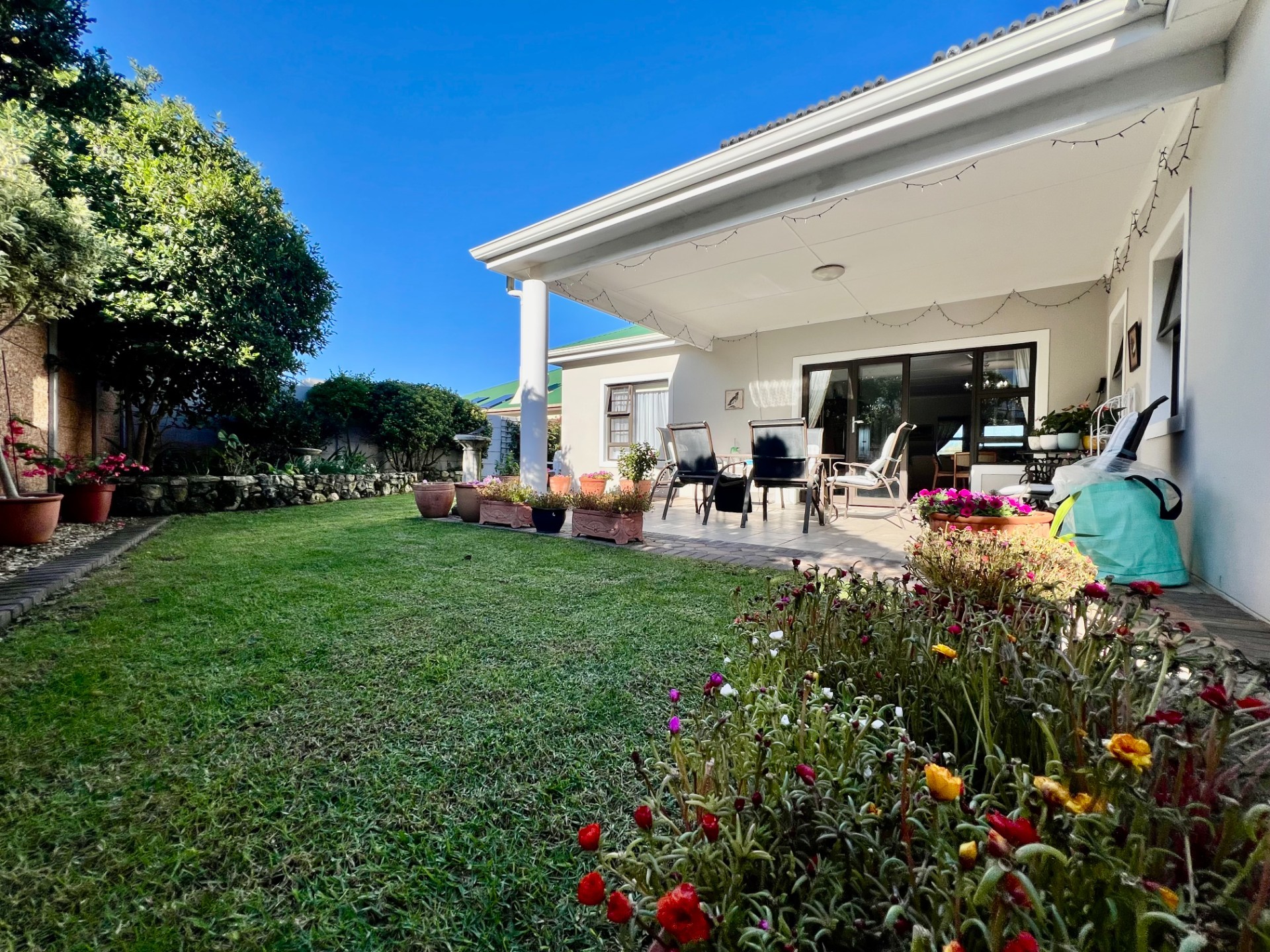 IMMACULATE HOME WITH MATURE GARDEN IN BERRISFORD PLACE.