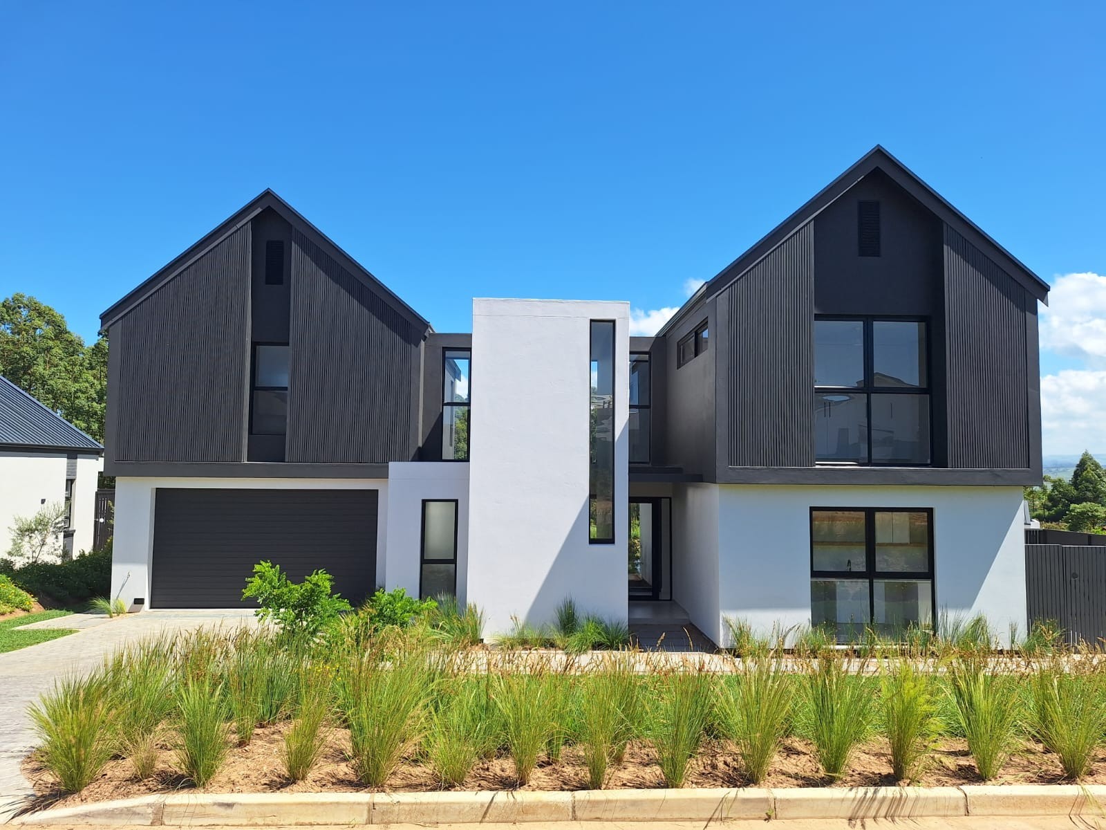 4 Bed 4.5 Bath Contemporary Sustainable Home in Elaleni Coastal Forest Estate