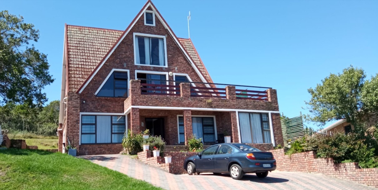 Distinct-Architecture - Multi-level timber A-frame